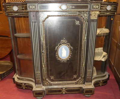 Lot 1403 - A mid-19th century ebonised, gilt metal...