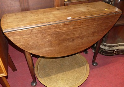 Lot 1405 - A 19th century mahogany drop flap supper table,...