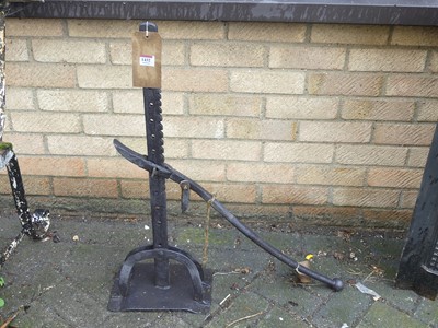 Lot 1432 - A cast iron cart jack