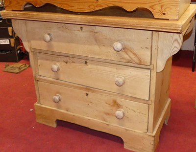 Lot 1418 - A reclaimed pine square front chest of three...