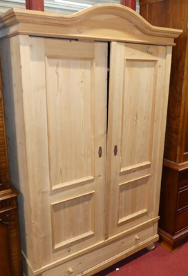 Lot 1427 - A French pine double door armoire, having...