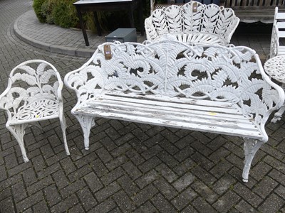 Lot 1457 - A white painted pierced cast metal and wood...