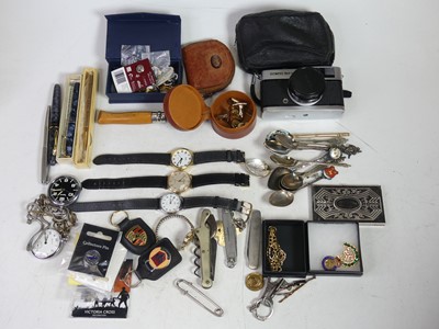 Lot 467 - A collection of badges, wristwatches,...