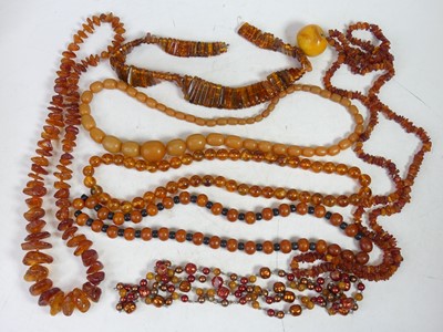 Lot 471 - A collection of faux amber beaded necklaces