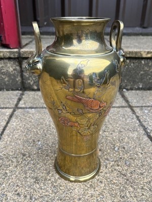 Lot 26 - A Chinese brass and copper inlaid vase, having...