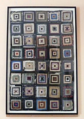 Lot 1122 - A 19th century silk and cotton patchwork quilt,...
