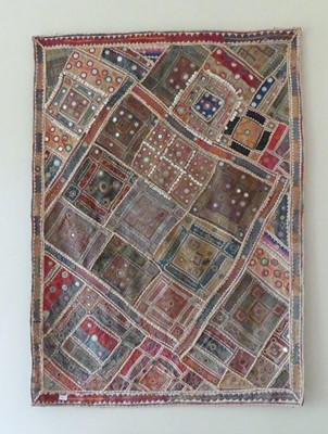 Lot 1125 - A vintage Jari patchwork and embroidered wall...