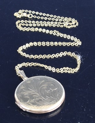 Lot 2594 - A modern 9ct gold picture locket, with leaf...