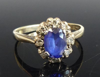 Lot 2631 - A yellow and white metal, sapphire and diamond...