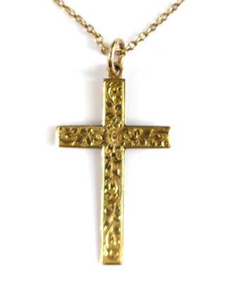 Lot 2636 - A 9ct yellow gold cross pendant, engraved with...