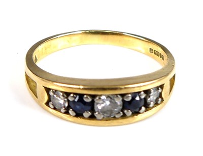 Lot 2640 - An 18ct yellow gold, sapphire and diamond half...