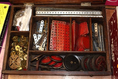 Lot 1528 - A wooden box containing a Meccano metal...