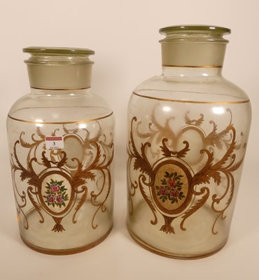 Lot 3 - A large floral gilt decorated glass jar and...