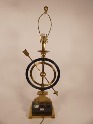 Lot 10 - A contemporary brass and steel table lamp in...