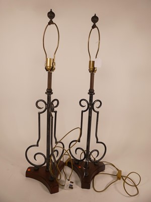 Lot 14 - A pair of contemporary wrought metal table...