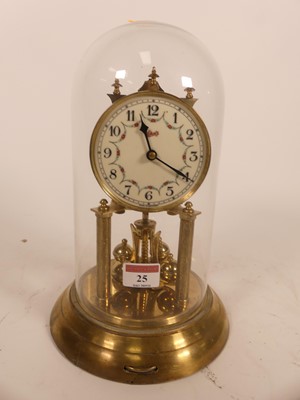 Lot 25 - A brass anniversary clock, the dial with...