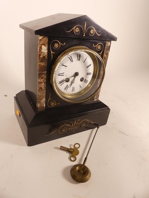 Lot 32 - A Victorian black slate mantel clock, the...