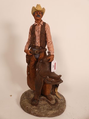 Lot 43 - A resin figure of a Gaucho, modelled standing...