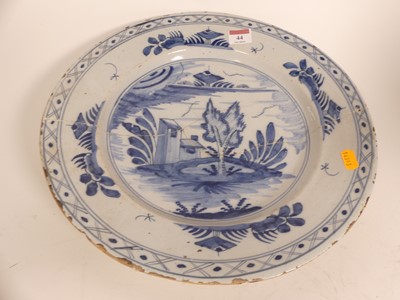 Lot 44 - An 18th century Delft charger, dia.35cm (a/f)