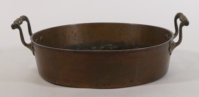 Lot 84 - A 19th century brass jam pan, having riveted...