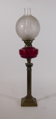 Lot 88 - A late 19th century oil lamp, having an acid...