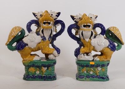 Lot 96 - A pair of Chinese polychrome glazed pottery...