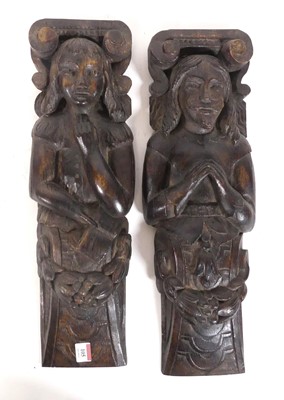 Lot 105 - A pair of antique carved oak figural panels, h....