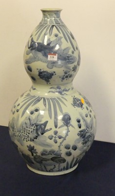 Lot 118 - A Chinese porcelain double-gourd vase, of...