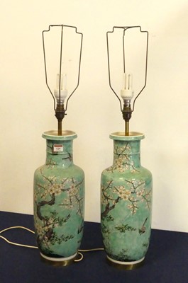 Lot 129 - A pair of Chinese porcelain table lamps, each...