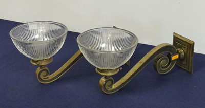 Lot 142 - A pair of brass scroll wall lights, each...