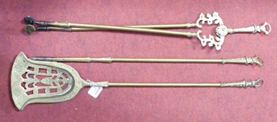 Lot 155 - A set of brass fire tools, in the Georgian taste