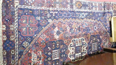 Lot 1162 - A Persian woollen blue ground Tabriz rug, 210...