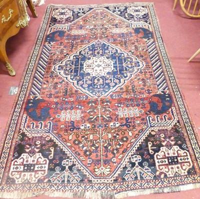 Lot 1171 - A Persian woollen red and blue ground Heriz...