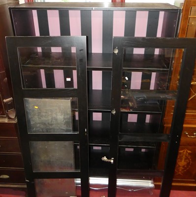 Lot 1179 - A contemporary black ash double door glazed...