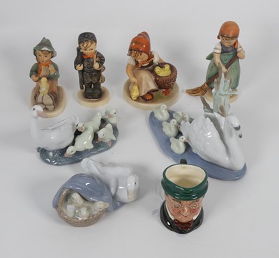 Lot 217 - A collection of ceramic figures to include...