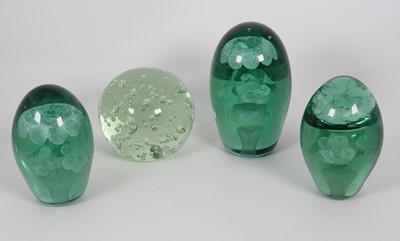 Lot 218 - A Victorian green glass dump weight having...