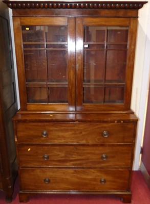 Lot 1184 - A 19th century mahogany secretaire bookcase,...