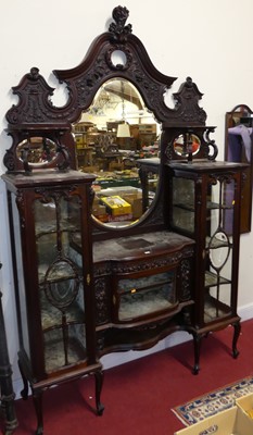 Lot 1188 - An impressive floral relief carved mahogany...