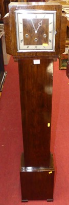 Lot 1201 - A 1930s figured walnut grand-daughter clock,...