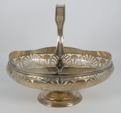 Lot 241 - A George V pierced silver table basket, having...