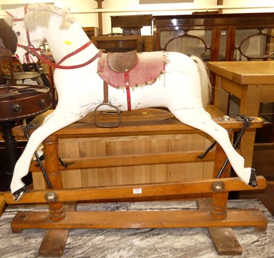 Lot 1205 - A circa 1920s child's rocking horse by Triang,...