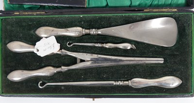 Lot 255 - A cased set of four silver handled implements,...