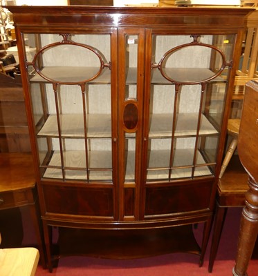 Lot 1246 - An Edwardian mahogany bow front double door...