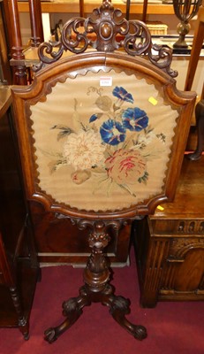 Lot 1261 - A mid-Victorian floral carved rosewood and...