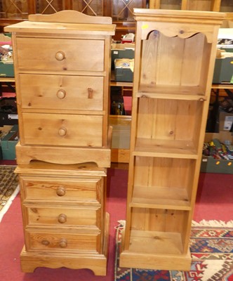 Lot 1272 - Two modern pine three-drawer bedside chests,...