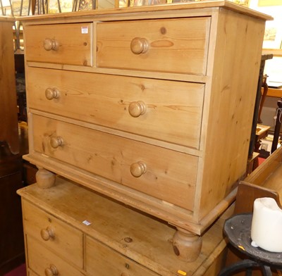 Lot 1273 - A contemporary pine low square front chest of...