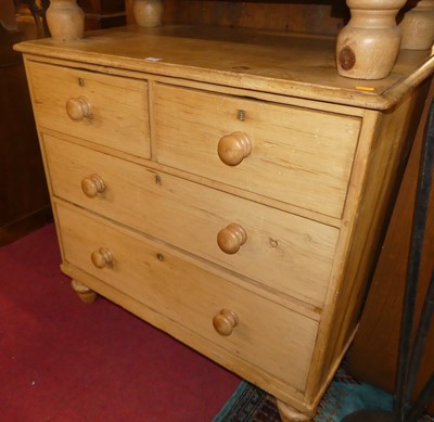 Lot 1274 - A Victorian pine round cornered chest of two...