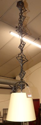 Lot 1279 - A contemporary black wrought metal floral...