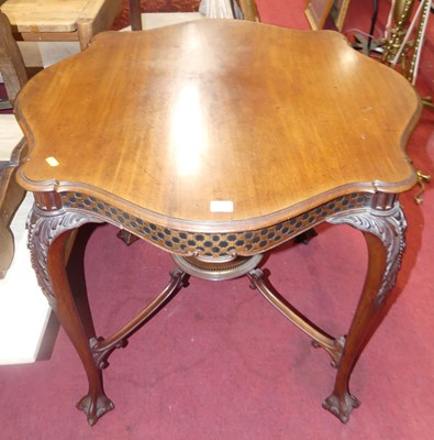 Lot 1295 - An Edwardian mahogany shaped top centre table,...