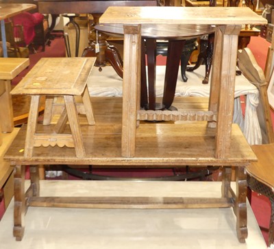 Lot 1297 - A Columbian provincial walnut plank top bench...